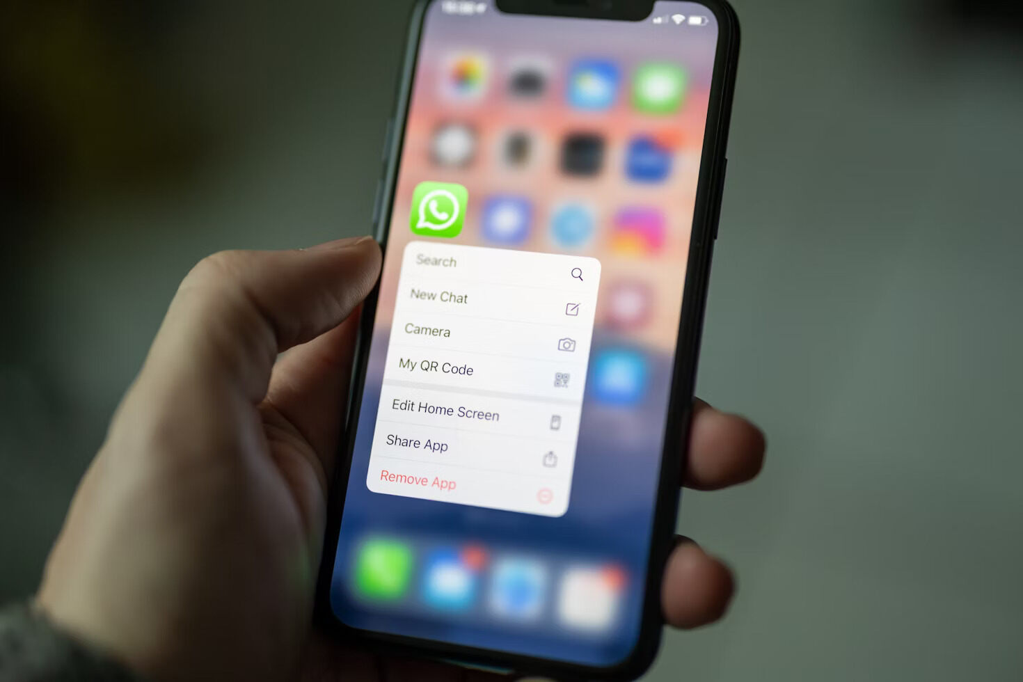 WhatsApp icon on a mobile phone
